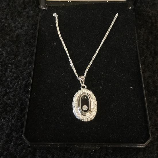 18K white gold and diamond oval pendant, on 9ct white gold chain